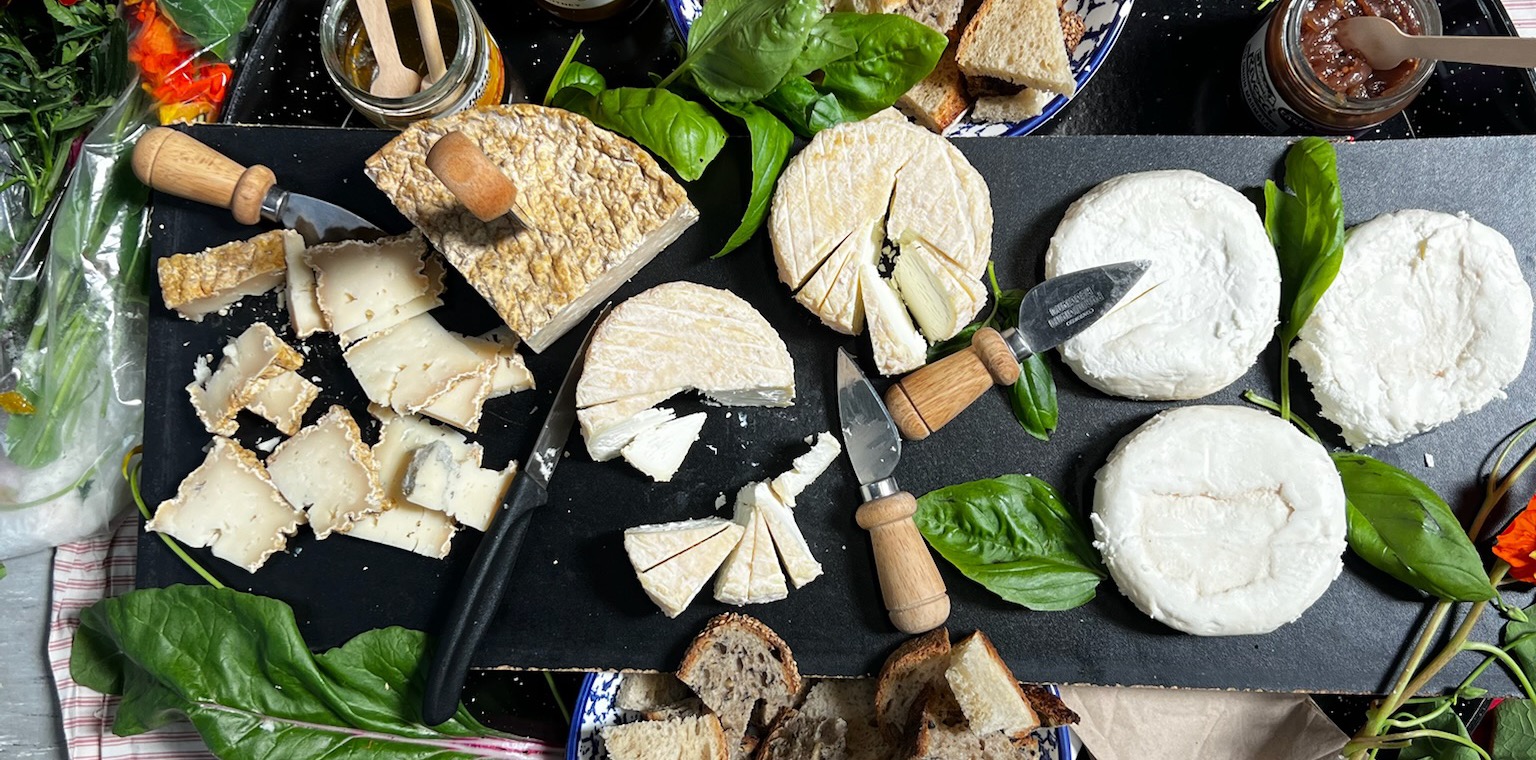 A board of Irish farmhouse cheeses, breads and preserves from the farm