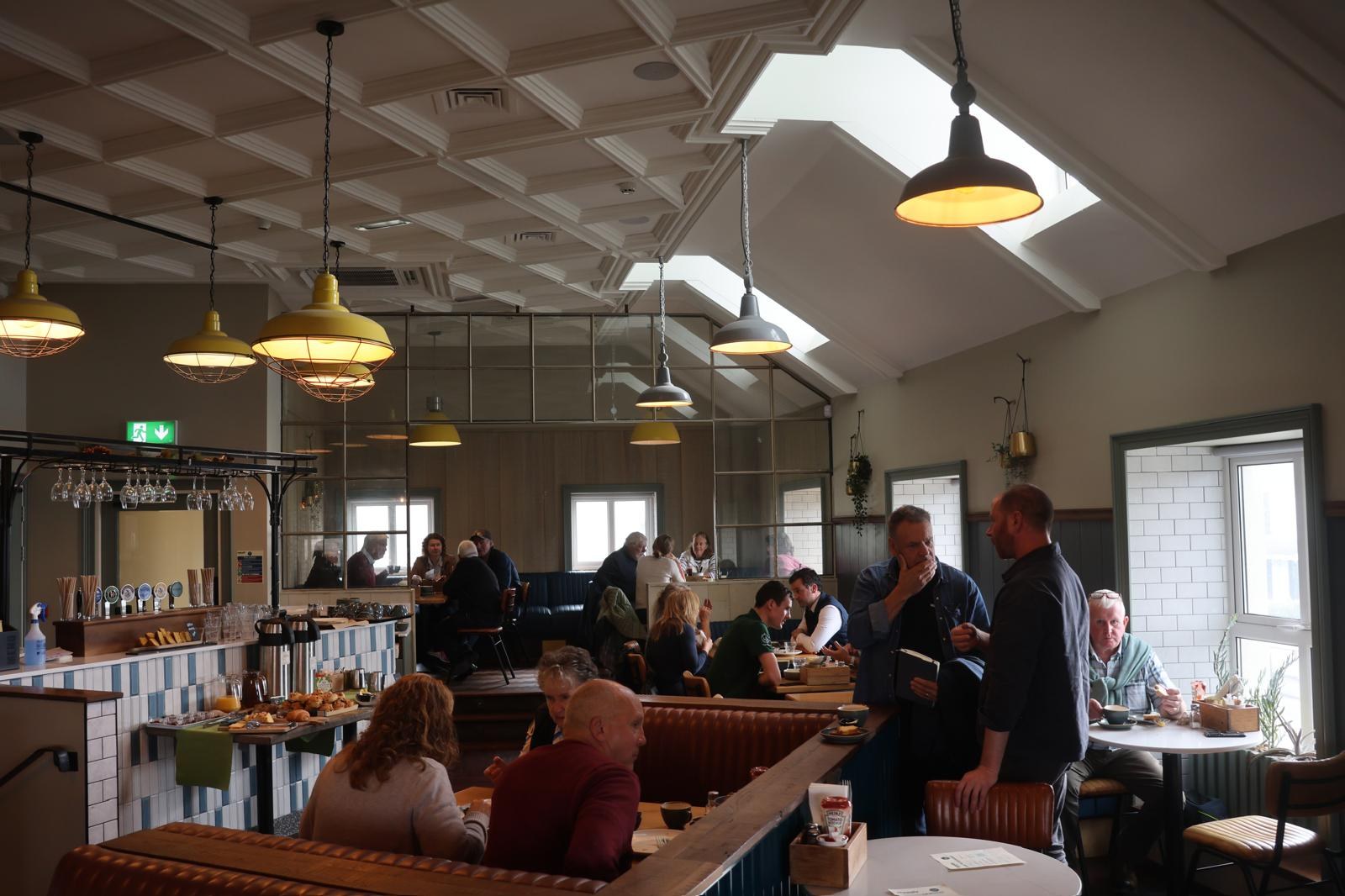 The upstairs room at Honestly Strandhill full of Organic Trust members at breakfast