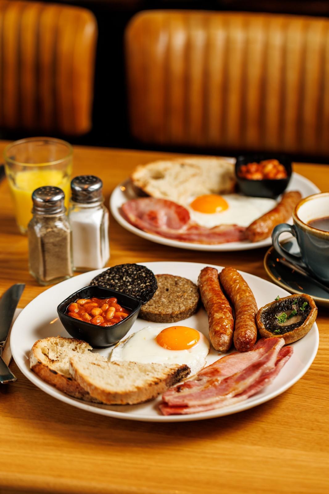 The Farmer’s Breakfast: sausages, bacon, black and white pudding, fried egg, beans, mushroom and sourdough toast